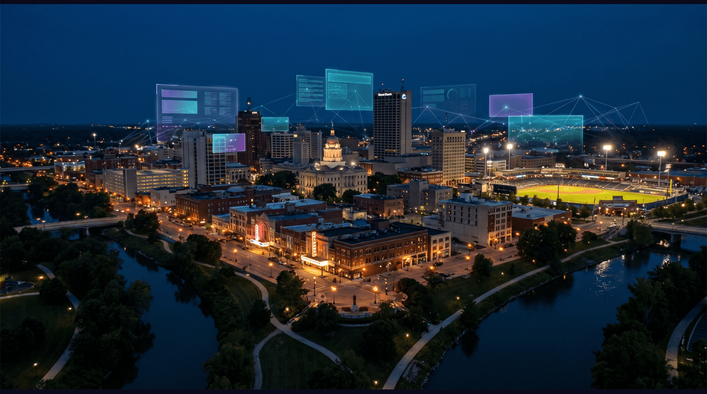 Fort Wayne skyline with Allen County Courthouse dome, Lincoln Bank Tower, Embassy Theatre marquee, Parkview Field ballpark, and Three Rivers riverfront against a dark navy sky with cyan and purple holographic data panels